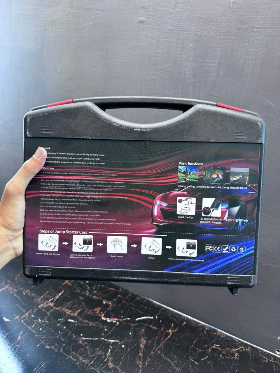 Multi-Function Car Jump Starter HW-0353 with Air Compressor - in use