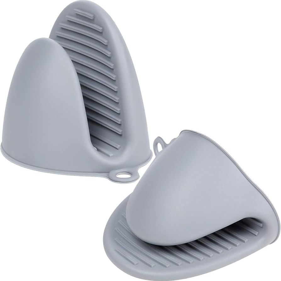 Heat Resistant Silicone Pot Holder Pair - in use